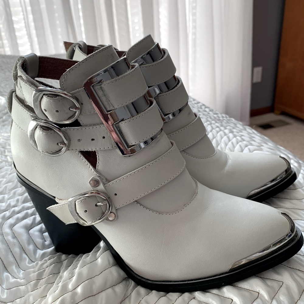 New Jeffrey Campbell White Booties with steel tip toes and buckles. Size 8. NWOB